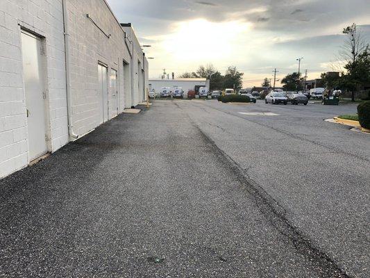 Parking at back of shopping strip