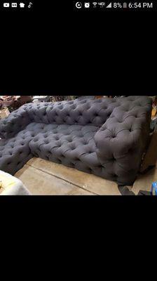 Re-upholstered tufted sectional