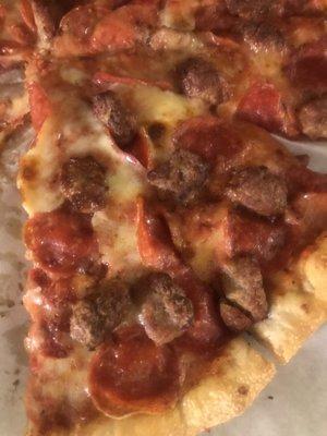 Pepperoni and sausage pizza