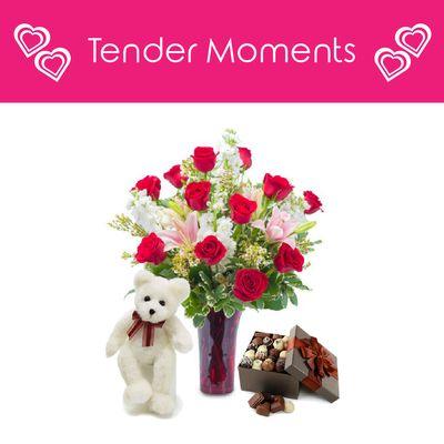 Send the full package of Valentine's Day with a crisp arrangement, soft bear and mouth-watering chocolates.