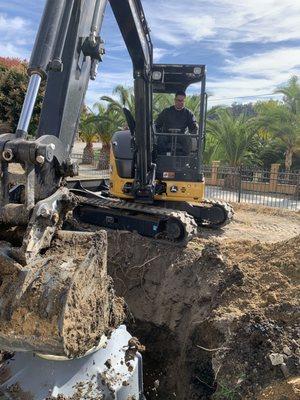 Installing 750 gallon trash tank.