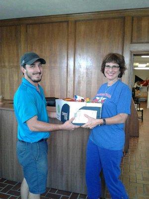 General Manager Curtis Long donating school supplies in Sep 2017.