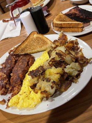 Corn beef hash & egg breakfast