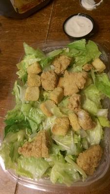 This is Pizza Hut's version of "Chicken Ceaser Salad". Pretty pathetic, think I will stick to the pizza which is not bad.