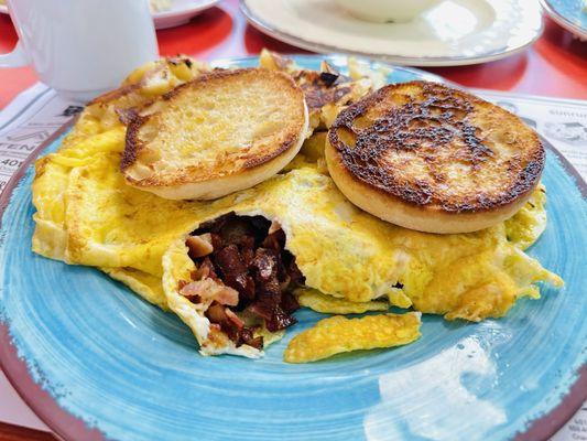 4 egg bacon and cheese omelette with a grilled English muffin and well-done home fries