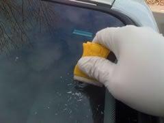 Finishing up a windshield chip repair