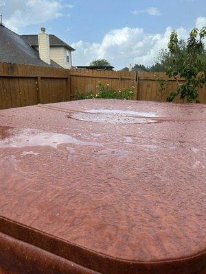 Cheap foam in cover creates a deep dip in center of tub.