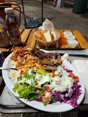 Chicken and lamb gyro with rice and salad free Turkish bread that comes with the meal