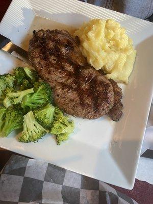 NY strip with real mashed potatoes and cooked broccoli.