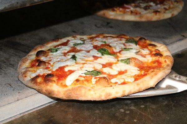 Classic Margherita! Fresh mozzarella, fresh basil, extra virgin olive oil, and Parmigiano regiano!