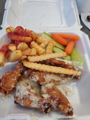 Chicken Parmesan Wings and fries.