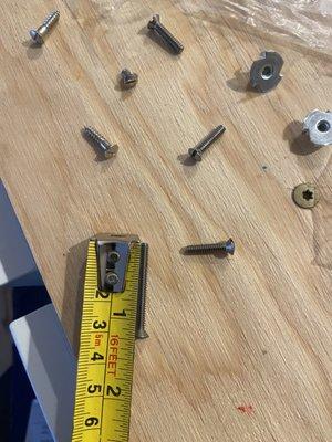 The screws are 1.25, too short for a standard drawer