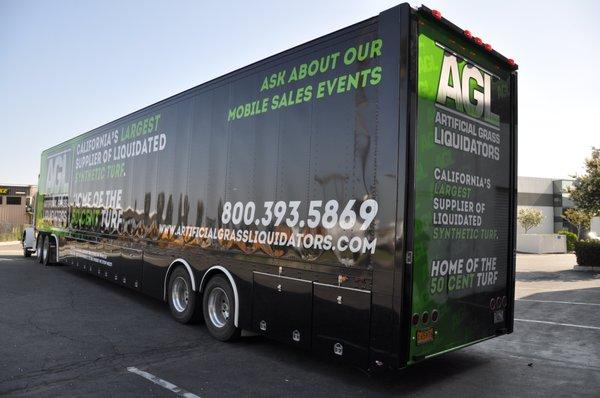 Semi trailer wrapped for artificial grass