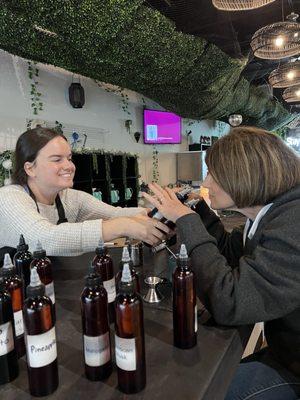 Jenn helping Donna smell combined scents