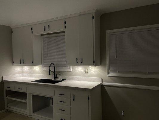 This is our progress photo. Kitchen is still not done but what a difference with our lovely new countertop that Alon helped us out with!