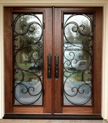 Wood & wrought iron double front entry doors. Sugar Land Texas