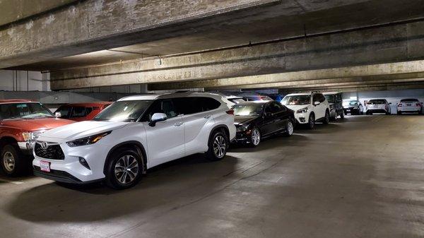 Double parked vehicles at Laurel St garage.