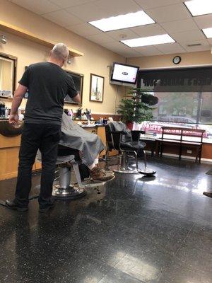 4 chairs and 2 Barbers. At least right now.