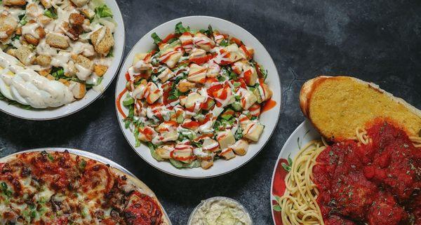 We offer a variety of pizzas, pastas, subs, and salads.