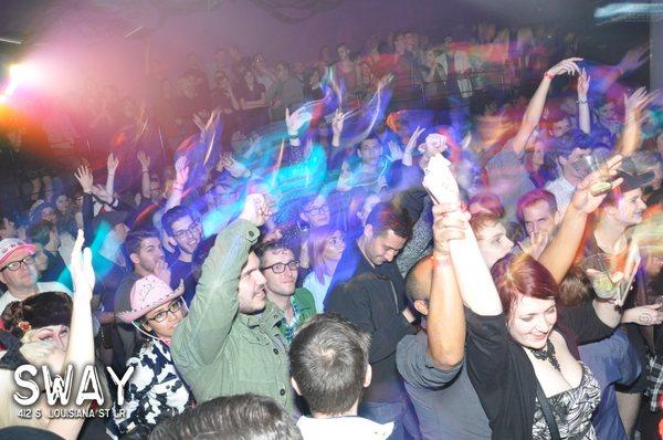 A crowd waits with excitement to see another star of RuPaul's Drag Race on stage at Sway, a downtown Little Rock dance club open since 2010.