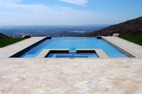 Vanishing edge pool as part of best landscaper design and construction