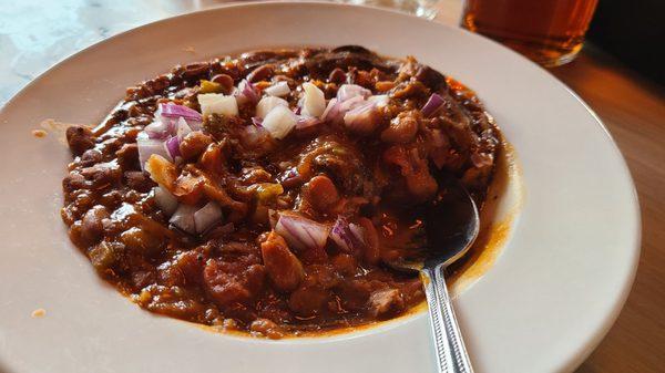 Bowl of Chili with onions and jalapenos is good