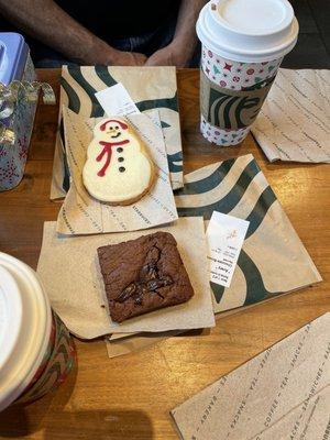 It's Christmas at Starbucks- adorable Snowman cookies and warmed chocolate brownies are so Tasty and Delicious