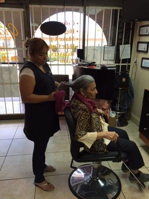 Abuelita is getting a hair cut ....