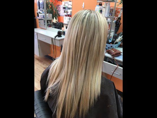 Platinum highlights for this Beauty. Hair by Demi