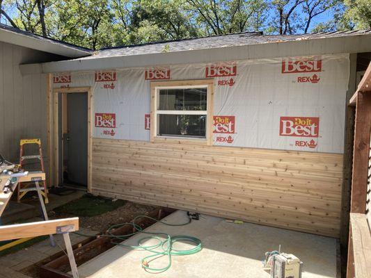 Cedar siding going up