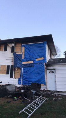 Securing the property and tarping the siding to prevent further damages. Priority Restoration 215.281.3473 Fire, Water, Mold, & Smoke