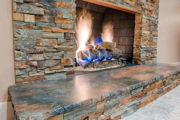 Veneer stone finished the look of a fireplace in a Phoenix, AZ home.