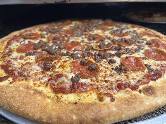 Meat Lovers - generously topped with pepperoni, bacon, sausage and ground beef!  Available in 10, 16 or 20 inch!