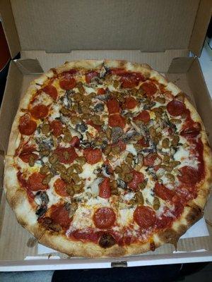 Large sausage, pepperoni and mushroom pizza. Very good!