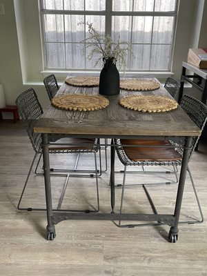 Fun example for an industrial kitchen table with distressed wood top!