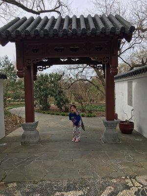 My daughter at the Chinese gardens entrance.