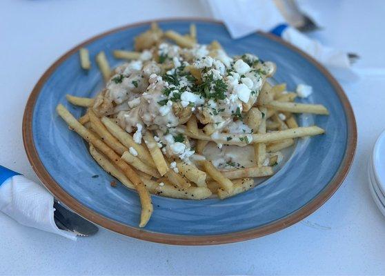 "Fried" or undercooked calamari with cold fries and gravy too start. Very disappointed.