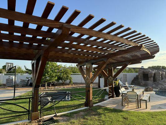 Our pergola they sanded, stained and sealed.