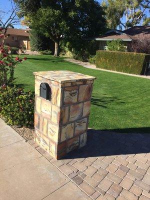 Masonry mailbox wrapped in Mexican burnt adobe.