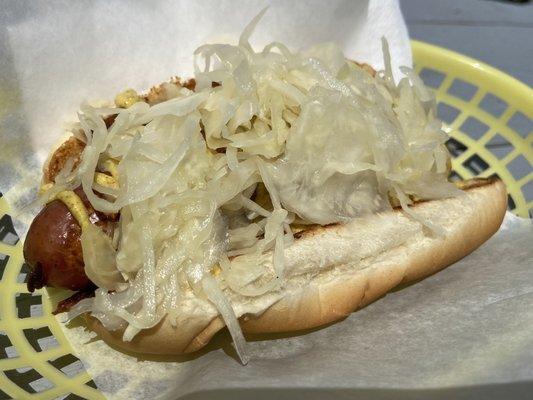 Outstanding local bratwurst with a crisp snap, grilled onions, mustard, and tangy crisp-fresh kraut.