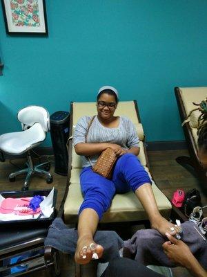 Vinnea getting her feet done.