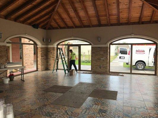 Our A Team installing storefront windows and doors @ Nuestra Parroquia San Felipe. Call us at 281-714-0745 for a free estimate.