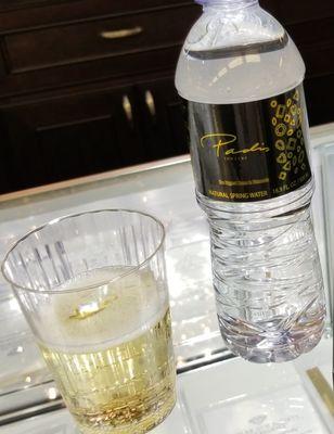 Complimentary sparkling wine and water