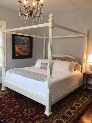 This beautiful king size guest room has a stunning private bath which  includes a slipper tub. Great for soaking after a long day