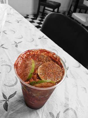 Mineral water with chamoy tajin, cucmber