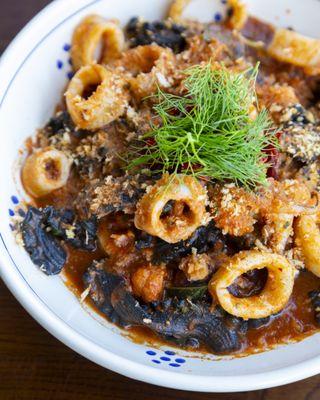 Mafaldine al Nero di Seppia- squid ink mafaldine, calamari, langoustine, and nduja tomato sauce