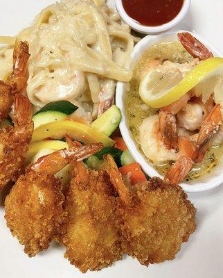 Shrimp lovers trio. 

Fried shrimp, shrimp scampi, fettuccine Alfredo with shrimp, veggies.