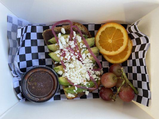 Avocado toast with black beans, pickled red onions and fresh salsa.