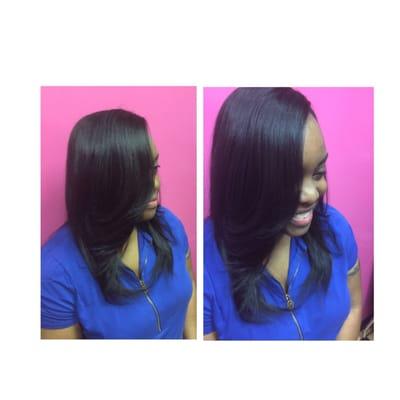 Hair extensions with a lace closure application. Done by Tacara Renee