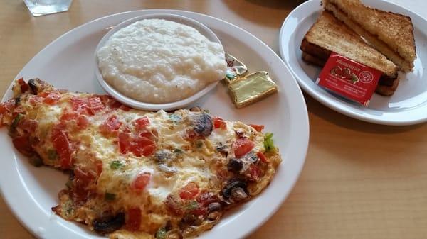 Make your own omelet: egg white, tomato,  green pepper, mushroom, mozzarella cheese with grits